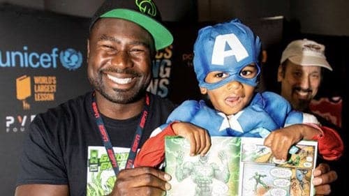 Ovie Mughelli presenting Gridiron Green with UNICEF